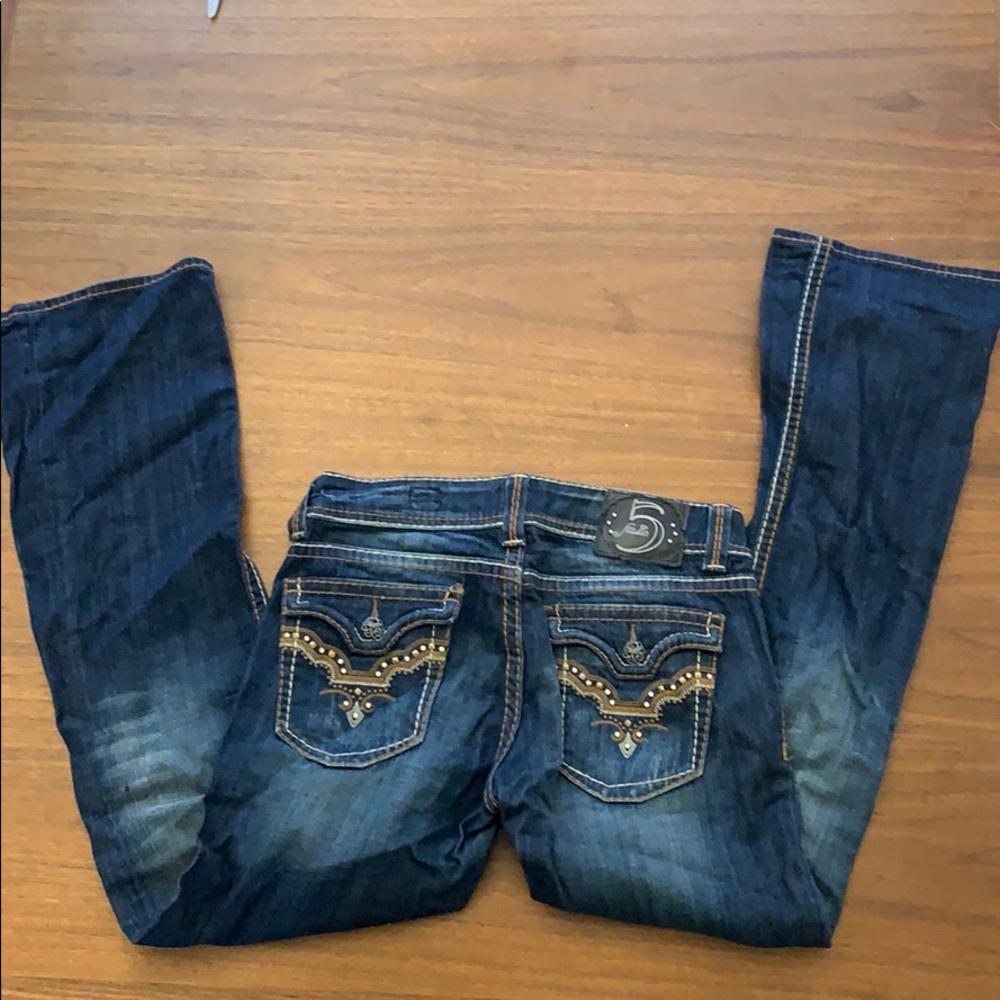Thick stitch boot cut jean with embellishment